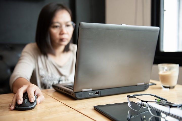 Filipino Working With Laptop